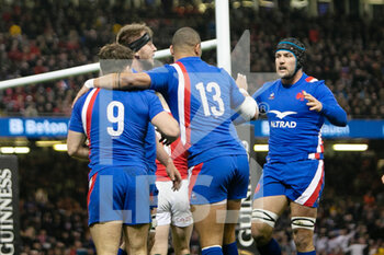 2022-03-11 - Anthony Jelonch of France celebrates after his try with Antoine Dupont, Gael Fickou, Francois Cros during the Six Nations 2022 rugby union match between Wales and France on March 11, 2022 at Principality Stadium in Cardiff, Wales - SIX NATIONS 2022 - WALES VS FRANCE - SIX NATIONS - RUGBY
