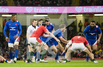 2022-03-11 - Antoine Dupont of France and Seb Davies, Josh Navidi of Wales during the Six Nations 2022 rugby union match between Wales and France on March 11, 2022 at Principality Stadium in Cardiff, Wales - SIX NATIONS 2022 - WALES VS FRANCE - SIX NATIONS - RUGBY