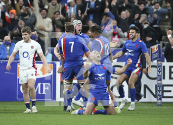 2022-03-20 - Maxime Lucu, Thibaut Flament, Jonathan Danty, Romain Ntamack of France celebrate the Grand Slam victory following the Six Nations 2022 rugby union match between France and England on March 19, 2022 at Stade de France in Saint-Denis near Paris, France - SIX NATIONS 2022 - FRANCE VS ENGLAND - SIX NATIONS - RUGBY