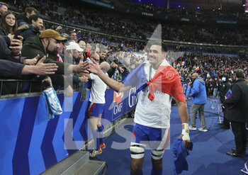 2022-03-20 - Dylan Cretin of France celebrates the Grand Slam victory following the Six Nations 2022 rugby union match between France and England on March 19, 2022 at Stade de France in Saint-Denis near Paris, France - SIX NATIONS 2022 - FRANCE VS ENGLAND - SIX NATIONS - RUGBY
