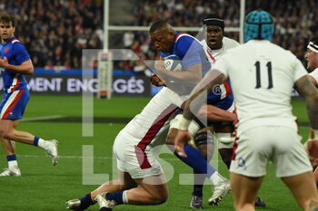 2022-03-20 - Cameron Woki (FRA) is tackled during the Six Nations 2022 rugby union match between France and England on March 19, 2022 at Stade de France in Saint-Denis, France - SIX NATIONS 2022 - FRANCE VS ENGLAND - SIX NATIONS - RUGBY