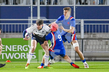 2022-02-25 - Scotland's Murray Redpath is tackled by France's Baptiste Jauneau during the Under - 20 Six Nations 2022, rugby union match between Scotland and France on February 25, 2022 at the DAM Healthcare Stadium in Edinburgh, Scotland - UNDER - 20 SIX NATIONS 2022 - SCOTLAND VS FRANCE - WORLD CUP - RUGBY