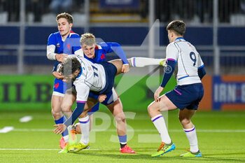 2022-02-25 - Scotland's Ollie Melville is tackled by France's Emilien Gailleton and France's Axel Bevia during the Under - 20 Six Nations 2022, rugby union match between Scotland and France on February 25, 2022 at the DAM Healthcare Stadium in Edinburgh, Scotland - UNDER - 20 SIX NATIONS 2022 - SCOTLAND VS FRANCE - WORLD CUP - RUGBY