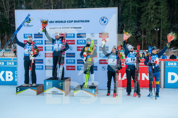2022-12-17 - Podium during the BMW IBU World Cup 2022, Annecy - Le Grand-Bornand, Men's 12,5 Km Pursuit, on December 17, 2022 in Le Grand-Bornand, France - BIATHLON - WORLD CUP - LE GRAND BORNAND - MEN'S 12,5 KM PURSUIT - BIATHLON - WINTER SPORTS