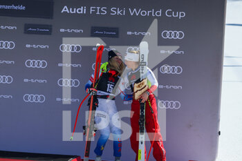 2022-03-05 - Mikaela Shiffrin (USA) and Lara Gut-Behrami (SUI) on the podium of the Lenzerheide SuperG (SUI) - 2022 FIS SKI WORLD CUP - WOMEN SUPER G - ALPINE SKIING - WINTER SPORTS