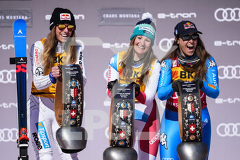 2022-02-27 - CRANS-MONTANA, SWITZERLAND - FEBRUARY 27: Priska Nufer of Switzerland (M, 1st place), Ester Ledecka of Czech Republic (L, 2nd place) and Sofia Goggia of Italy (3rd place)  during the Audi FIS Alpine Ski World Cup Crans-Montana Women’s Downhill on February 27, 2022 in Crans-Montana, Switzerland. - AUDI FIS ALPINE SKI WORLD CUP CRANS-MONTANA WOMEN'S DOWNHILL - ALPINE SKIING - WINTER SPORTS