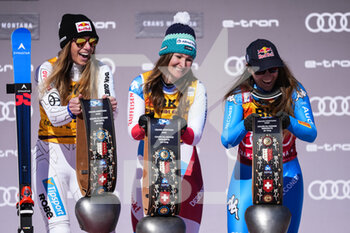 2022-02-27 - CRANS-MONTANA, SWITZERLAND - FEBRUARY 27: Priska Nufer of Switzerland (M, 1st place), Ester Ledecka of Czech Republic (L, 2nd place) and Sofia Goggia of Italy (3rd place)  during the Audi FIS Alpine Ski World Cup Crans-Montana Women’s Downhill on February 27, 2022 in Crans-Montana, Switzerland. - AUDI FIS ALPINE SKI WORLD CUP CRANS-MONTANA WOMEN'S DOWNHILL - ALPINE SKIING - WINTER SPORTS