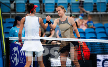 2022-01-10 - Ajla Tomljanovic of Australia & Anna Karolina Schmiedlova of Slovakia in action during the first round at the 2022 Sydney Tennis Classic, WTA 500 tennis tournament on January 11, 2022 at NSW Tennis Centre in Sydney, Australia - 2022 SYDNEY TENNIS CLASSIC, WTA 500 TENNIS TOURNAMENT - INTERNATIONALS - TENNIS