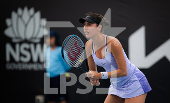 2022-01-11 - Oceane Dodin of France in action against Belinda Bencic of Switzerland during the second round of the 2022 Sydney Tennis Classic, WTA 500 tennis tournament on January 12, 2022 at NSW Tennis Centre in Sydney, Australia - 2022 SYDNEY TENNIS CLASSIC, WTA 500 TENNIS TOURNAMENT - INTERNATIONALS - TENNIS
