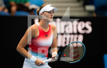 2022-01-17 - Kristina Mladenovic of France in action against Belinda Bencic of Switzerland during the first round of the 2022 Australian Open, WTA Grand Slam tennis tournament on January 17, 2022 at Melbourne Park in Melbourne, Australia - 2022 AUSTRALIAN OPEN, WTA GRAND SLAM TENNIS TOURNAMENT - INTERNATIONALS - TENNIS