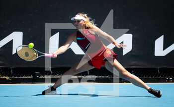 2022-01-17 - Marta Kostyuk of Ukraine in action against Diane Parry of France during the first round of the 2022 Australian Open, WTA Grand Slam tennis tournament on January 17, 2022 at Melbourne Park in Melbourne, Australia - 2022 AUSTRALIAN OPEN, WTA GRAND SLAM TENNIS TOURNAMENT - INTERNATIONALS - TENNIS
