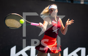 2022-01-17 - Marta Kostyuk of Ukraine in action against Diane Parry of France during the first round of the 2022 Australian Open, WTA Grand Slam tennis tournament on January 17, 2022 at Melbourne Park in Melbourne, Australia - 2022 AUSTRALIAN OPEN, WTA GRAND SLAM TENNIS TOURNAMENT - INTERNATIONALS - TENNIS