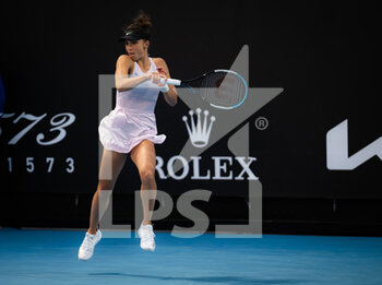 2022-01-17 - Jaqueline Cristian of Romania in action against Greet Minnen of Belgium during the first round of the 2022 Australian Open, WTA Grand Slam tennis tournament on January 17, 2022 at Melbourne Park in Melbourne, Australia - 2022 AUSTRALIAN OPEN, WTA GRAND SLAM TENNIS TOURNAMENT - INTERNATIONALS - TENNIS