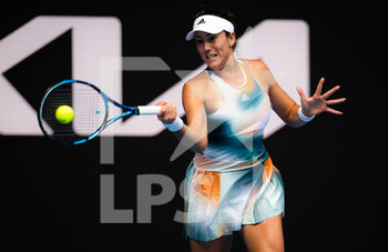2022-01-18 - Garbine Muguruza of Spain in action against Clara Burel of France during the first round of the 2022 Australian Open, WTA Grand Slam tennis tournament on January 18, 2022 at Melbourne Park in Melbourne, Australia - 2022 AUSTRALIAN OPEN, WTA GRAND SLAM TENNIS TOURNAMENT - INTERNATIONALS - TENNIS
