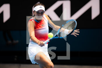 2022-01-18 - Clara Burel of France in action against Garbine Muguruza of Spain during the first round of the 2022 Australian Open, WTA Grand Slam tennis tournament on January 18, 2022 at Melbourne Park in Melbourne, Australia - 2022 AUSTRALIAN OPEN, WTA GRAND SLAM TENNIS TOURNAMENT - INTERNATIONALS - TENNIS
