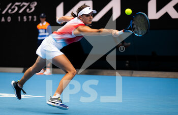2022-01-18 - Clara Burel of France in action against Garbine Muguruza of Spain during the first round of the 2022 Australian Open, WTA Grand Slam tennis tournament on January 18, 2022 at Melbourne Park in Melbourne, Australia - 2022 AUSTRALIAN OPEN, WTA GRAND SLAM TENNIS TOURNAMENT - INTERNATIONALS - TENNIS