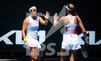 2022-01-19 - Caroline Garcia of France & Kristina Mladenovic of France in action during the first round of doubles of the 2022 Australian Open, WTA Grand Slam tennis tournament on January 19, 2022 at Melbourne Park in Melbourne, Australia - 2022 AUSTRALIAN OPEN, WTA GRAND SLAM TENNIS TOURNAMENT - INTERNATIONALS - TENNIS