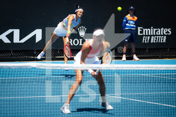 2022-01-19 - Caroline Garcia of France & Kristina Mladenovic of France in action during the first round of doubles of the 2022 Australian Open, WTA Grand Slam tennis tournament on January 19, 2022 at Melbourne Park in Melbourne, Australia - 2022 AUSTRALIAN OPEN, WTA GRAND SLAM TENNIS TOURNAMENT - INTERNATIONALS - TENNIS