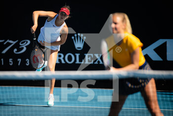 2022-01-19 - Anna Karolina Schmiedlova of Slovakia & Kimberley Zimmermann of Belgium in action during the first round of doubles at the 2022 Australian Open, WTA Grand Slam tennis tournament on January 19, 2022 at Melbourne Park in Melbourne, Australia - 2022 AUSTRALIAN OPEN, WTA GRAND SLAM TENNIS TOURNAMENT - INTERNATIONALS - TENNIS