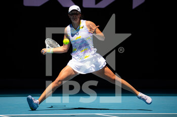 2022-01-19 - Iga Swiatek of Poland in action against Rebecca Peterson of Sweden during the second round of the 2022 Australian Open, WTA Grand Slam tennis tournament on January 20, 2022 at Melbourne Park in Melbourne, Australia - 2022 AUSTRALIAN OPEN, WTA GRAND SLAM TENNIS TOURNAMENT - INTERNATIONALS - TENNIS