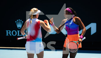 2022-01-20 - Catherine McNally of the United States & Cori Gauff of the United States during the first round of doubles at the 2022 Australian Open, WTA Grand Slam tennis tournament on January 20, 2022 at Melbourne Park in Melbourne, Australia - 2022 AUSTRALIAN OPEN, WTA GRAND SLAM TENNIS TOURNAMENT - INTERNATIONALS - TENNIS
