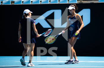 2022-01-20 - Ena Shibahara of Japan & Shuko Aoyama of Japan in action during the second round of doubles at the 2022 Australian Open, WTA Grand Slam tennis tournament on January 21, 2022 at Melbourne Park in Melbourne, Australia - 2022 AUSTRALIAN OPEN, WTA GRAND SLAM TENNIS TOURNAMENT - INTERNATIONALS - TENNIS