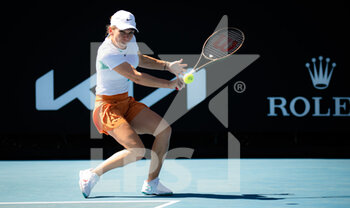 2022-01-20 - Simona Halep of Romania in action during the second round of doubles with partner Elena Gabriela Ruse at the 2022 Australian Open, WTA Grand Slam tennis tournament on January 21, 2022 at Melbourne Park in Melbourne, Australia - 2022 AUSTRALIAN OPEN, WTA GRAND SLAM TENNIS TOURNAMENT - INTERNATIONALS - TENNIS