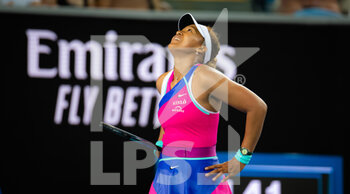 2022-01-21 - Naomi Osaka of Japan in action against Amanda Anisimova of the United States during the third round at the 2022 Australian Open, WTA Grand Slam tennis tournament on January 21, 2022 at Melbourne Park in Melbourne, Australia - 2022 AUSTRALIAN OPEN, WTA GRAND SLAM TENNIS TOURNAMENT - INTERNATIONALS - TENNIS