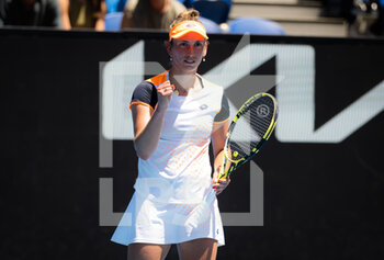 2022-01-22 - Elise Mertens of Belgium in action against Shuai Zhang of China during the third round at the 2022 Australian Open, WTA Grand Slam tennis tournament on January 22, 2022 at Melbourne Park in Melbourne, Australia - 2022 AUSTRALIAN OPEN, WTA GRAND SLAM TENNIS TOURNAMENT - INTERNATIONALS - TENNIS