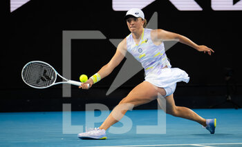 2022-01-22 - Iga Swiatek of Poland in action against Daria Kasatkina of Russia during the third round at the 2022 Australian Open, WTA Grand Slam tennis tournament on January 22, 2022 at Melbourne Park in Melbourne, Australia - 2022 AUSTRALIAN OPEN, WTA GRAND SLAM TENNIS TOURNAMENT - INTERNATIONALS - TENNIS