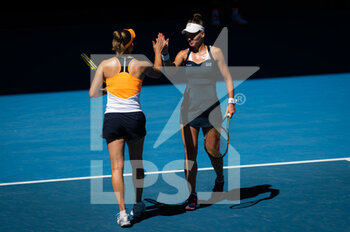 2022-01-23 - Elise Mertens of Belgium & Veronika Kudermetova of Russia in action during the third doubles round at the 2022 Australian Open, WTA Grand Slam tennis tournament on January 23, 2022 at Melbourne Park in Melbourne, Australia - 2022 AUSTRALIAN OPEN, WTA GRAND SLAM TENNIS TOURNAMENT - INTERNATIONALS - TENNIS