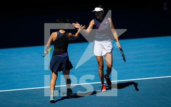 2022-01-23 - Zhaoxuan Yang of China & Yifan Xu of China in action during the third doubles round at the 2022 Australian Open, WTA Grand Slam tennis tournament on January 23, 2022 at Melbourne Park in Melbourne, Australia - 2022 AUSTRALIAN OPEN, WTA GRAND SLAM TENNIS TOURNAMENT - INTERNATIONALS - TENNIS