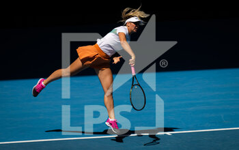 2022-01-24 - Marta Kostyuk of Ukraine in action during the third round of doubles at the 2022 Australian Open, WTA Grand Slam tennis tournament on January 24, 2022 at Melbourne Park in Melbourne, Australia - 2022 AUSTRALIAN OPEN, WTA GRAND SLAM TENNIS TOURNAMENT - INTERNATIONALS - TENNIS