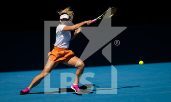 2022-01-24 - Marta Kostyuk of Ukraine in action during the third round of doubles at the 2022 Australian Open, WTA Grand Slam tennis tournament on January 24, 2022 at Melbourne Park in Melbourne, Australia - 2022 AUSTRALIAN OPEN, WTA GRAND SLAM TENNIS TOURNAMENT - INTERNATIONALS - TENNIS