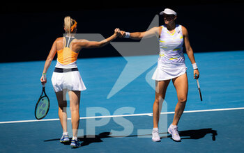 2022-01-24 - Storm Sanders of Australia & Caroline Dolehide of the United States in action during the third round of doubles at the 2022 Australian Open, WTA Grand Slam tennis tournament on January 24, 2022 at Melbourne Park in Melbourne, Australia - 2022 AUSTRALIAN OPEN, WTA GRAND SLAM TENNIS TOURNAMENT - INTERNATIONALS - TENNIS