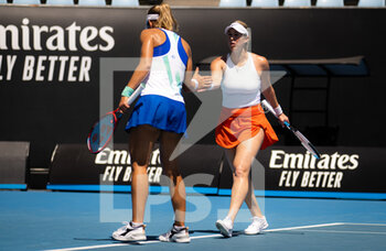 2022-01-24 - Alexa Guarachi of Chile & Nicole Melichar-Martinez of the United States in action during the third round of doubles at the 2022 Australian Open, WTA Grand Slam tennis tournament on January 24, 2022 at Melbourne Park in Melbourne, Australia - 2022 AUSTRALIAN OPEN, WTA GRAND SLAM TENNIS TOURNAMENT - INTERNATIONALS - TENNIS