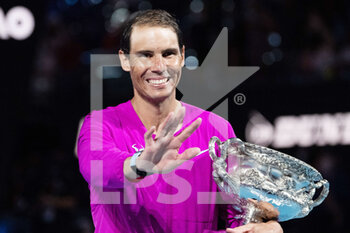 2022-01-28 - Rafael Nadal from Spain celebrates winning with he trophy his Men's Singles Finals match against Daniil Medvedev from Russia at the 2022 Australian Open, Grand Slam tennis tournament on January 30, 2022 at Melbourne Park in Melbourne, Australia - 2022 AUSTRALIAN OPEN, GRAND SLAM TENNIS TOURNAMENT - INTERNATIONALS - TENNIS