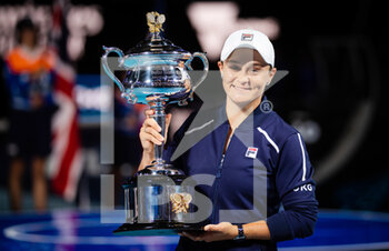 2022-01-29 - Ashleigh Barty of Australia poses with the champions trophy after winning against Danielle Collins of United States the final of the 2022 Australian Open, Grand Slam tennis tournament on January 29, 2022 at Melbourne Park in Melbourne, Australia - 2022 AUSTRALIAN OPEN, GRAND SLAM TENNIS TOURNAMENT - INTERNATIONALS - TENNIS