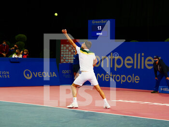 2022-02-02 - Filip Krajinovic of Serbia in action against Jo-Wilfried Tsonga of France during the Open Sud de France 2022, ATP 250 tennis tournament on February 2, 2022 at Sud de France Arena in Montpellier, France - OPEN SUD DE FRANCE 2022, ATP 250 TENNIS TOURNAMENT - INTERNATIONALS - TENNIS