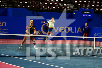2022-02-03 - Alex Molcan (SVK) and Roman Jebavy (CZE) in action against Jonny O'Mara (GBR) and Hunter Reese (USA) during the doubles quarter-final at the Open Sud de France 2022, ATP 250 tennis tournament on February 3, 2022 at Sud de France Arena in Montpellier, France - OPEN SUD DE FRANCE 2022, ATP 250 TENNIS TOURNAMENT - INTERNATIONALS - TENNIS