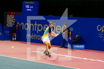 2022-02-03 - David Goffin of Belgium in action against Adrian Mannarino of France during the Open Sud de France 2022, ATP 250 tennis tournament on February 3, 2022 at Sud de France Arena in Montpellier, France - OPEN SUD DE FRANCE 2022, ATP 250 TENNIS TOURNAMENT - INTERNATIONALS - TENNIS