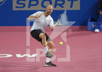 2022-02-03 - Adrian Mannarino of France in action against David Goffin of Belgium during the Open Sud de France 2022, ATP 250 tennis tournament on February 3, 2022 at Sud de France Arena in Montpellier, France - OPEN SUD DE FRANCE 2022, ATP 250 TENNIS TOURNAMENT - INTERNATIONALS - TENNIS