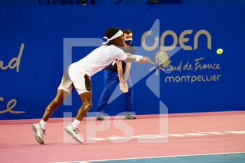 2022-02-03 - Mikael Ymer of Sweden in action against Gael Monfils of France during the Open Sud de France 2022, ATP 250 tennis tournament on February 3, 2022 at Sud de France Arena in Montpellier, France - OPEN SUD DE FRANCE 2022, ATP 250 TENNIS TOURNAMENT - INTERNATIONALS - TENNIS
