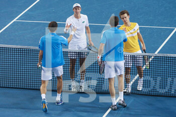 2022-02-04 - Pierre-Hughes Herbert, Nicolas Mahut of France and Luca Van Assche, Sascha Gueymard Wayenburg of France during the doubles quarter-finals at Open Sud de France 2022, ATP 250 tennis tournament on February 4, 2022 at Sud de France Arena in Montpellier, France - OPEN SUD DE FRANCE 2022, ATP 250 TENNIS TOURNAMENT - INTERNATIONALS - TENNIS