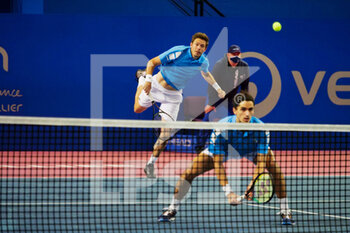 2022-02-06 - Nicolas Mahut and Pierre-Hughes Herbert of France during the Double final at the Open Sud de Fance 2022, ATP 250 tennis tournament on February 6, 2022 at Sud de France Arena in Montpellier France - OPEN SUD DE FRANCE 2022, ATP 250 TENNIS TOURNAMENT - INTERNATIONALS - TENNIS