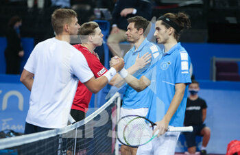 2022-02-06 - Nicolas Mahut and Pierre-Hughes Herbert of France and Lloyd Glasspool of Great Britain, Harri Heliovaara of Finland during the Double final at the Open Sud de Fance 2022, ATP 250 tennis tournament on February 6, 2022 at Sud de France Arena in Montpellier France - OPEN SUD DE FRANCE 2022, ATP 250 TENNIS TOURNAMENT - INTERNATIONALS - TENNIS