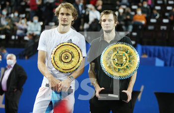 2022-02-06 - Alexander Zverev of Germany with the runner-up trophy and Alexander Bublik of Kazakhstan with the winner trophy during the final of the Open Sud de France 2022, ATP 250 tennis tournament on February 6, 2022 at Sud de France Arena in Montpellier, France - OPEN SUD DE FRANCE 2022, ATP 250 TENNIS TOURNAMENT - INTERNATIONALS - TENNIS