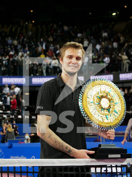 2022-02-06 - Alexander Bublik of Kazakhstan celebrates with the trophy after winning against Alexander Zverev of Germany during the final of the Open Sud de France 2022, ATP 250 tennis tournament on February 6, 2022 at Sud de France Arena in Montpellier, France - OPEN SUD DE FRANCE 2022, ATP 250 TENNIS TOURNAMENT - INTERNATIONALS - TENNIS