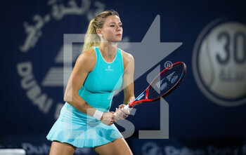 2022-02-14 - Camila Giorgi of Italy in action against Petra Kvitova of the Czech Republic during the first round of the 2022 Dubai Duty Free Tennis Championships WTA 1000 tennis tournament on February 14, 2022 at The Aviation Club Tennis Centre in Dubai, UAE - 2022 DUBAI DUTY FREE TENNIS CHAMPIONSHIPS WTA 1000 TENNIS TOURNAMENT - INTERNATIONALS - TENNIS