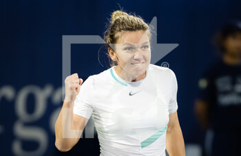 2022-02-16 - Simona Halep of Romania in action against Elena-Gabriela Ruse of Romania during the second round of the 2022 Dubai Duty Free Tennis Championships WTA 1000 tennis tournament on February 16, 2022 at The Aviation Club Tennis Centre in Dubai, UAE - 2022 DUBAI DUTY FREE TENNIS CHAMPIONSHIPS WTA 1000 TENNIS TOURNAMENT - INTERNATIONALS - TENNIS